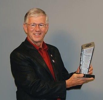 Larry Potterfield with the 2011 Shooting Industry Academy of Excellence Award Larry Potterfield with the 2011 Shooting Industry Academy of Excellence Award