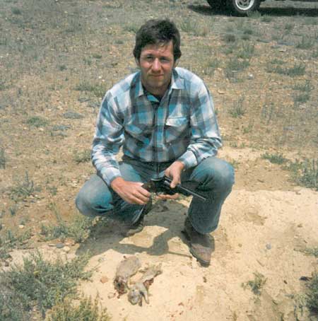 Larry in a prairie dog field with a S&W M-28. Larry in a prairie dog field with a S&W M-28.