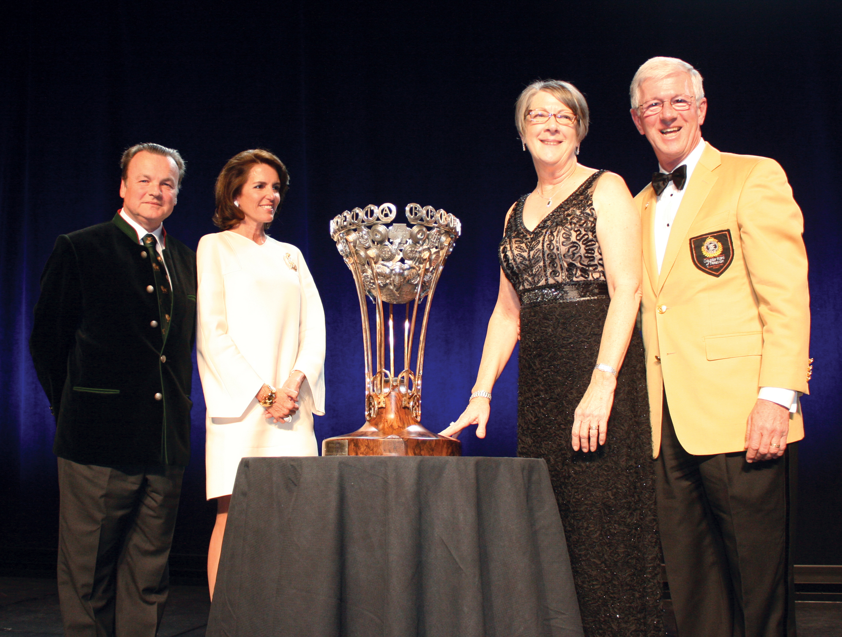 Larry and Brenda Potterfield Receiving the 2015 Beretta and SCI Foundation Conservation Leadership Award Trophy from Pietro Gussalli Beretta and his wife Gretchen Gussalli Beretta Harnischfeyger Larry and Brenda Potterfield Receiving the 2015 Beretta and SCI Foundation Conservation Leadership Award Trophy from Pietro Gussalli Beretta and his wife Gretchen Gussalli Beretta Harnischfeyger