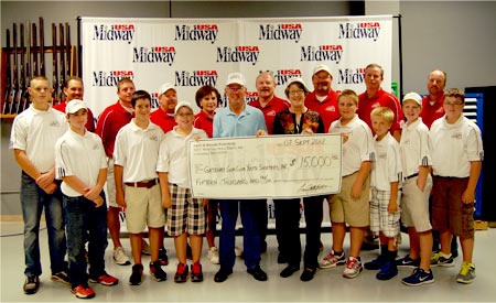 MidwayUSA owners Larry and Brenda Potterfield (center) with members from the Gateway Gun Club Youth Shooters MidwayUSA owners Larry and Brenda Potterfield (center) with members from the Gateway Gun Club Youth Shooters