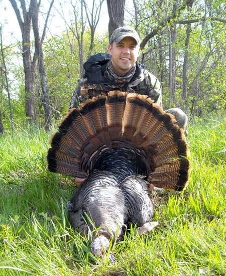 Jerod Smothers with a Missouri Eastern turkey taken with a Benelli Nova 12 Gauge. Jerod Smothers with a Missouri Eastern turkey taken with a Benelli Nova 12 Gauge.