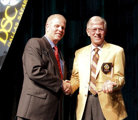 Past DSC President George Chamblee (Left) presenting the sponsorship appreciation plaque to Larry Potterfield, Founder and CEO of MidwayUSA, at the 2011 DSC convention. Past DSC President George Chamblee (Left) presenting the sponsorship appreciation plaque to Larry Potterfield, Founder and CEO of MidwayUSA, at the 2011 DSC convention.