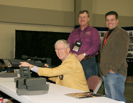Larry Potterfield (seated), Founder and CEO of MidwayUSA, with Eric Tyksen of MDF (right) and Rocky Mraz from Real Time Targets Larry Potterfield (seated), Founder and CEO of MidwayUSA, with Eric Tyksen of MDF (right) and Rocky Mraz from Real Time Targets