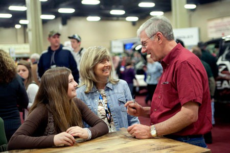 MidwayUSA Founder and CEO Larry Potterfield visiting with a future turkey hunter at the 2012 Convention MidwayUSA Founder and CEO Larry Potterfield visiting with a future turkey hunter at the 2012 Convention