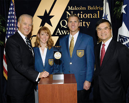 Brenda and I chose Matt Fleming and Deanna Herwald to represent the Company on the stage with Vice-President Biden and Secretary Locke – a great memory for each of them. Brenda and I chose Matt Fleming and Deanna Herwald to represent the Company on the stage with Vice-President Biden and Secretary Locke – a great memory for each of them.