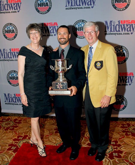 MidwayUSA owners Larry and Brenda Potterfield with Doug Koenig (center) at the 2011 Bianchi Cup Awards Ceremony MidwayUSA owners Larry and Brenda Potterfield with Doug Koenig (center) at the 2011 Bianchi Cup Awards Ceremony